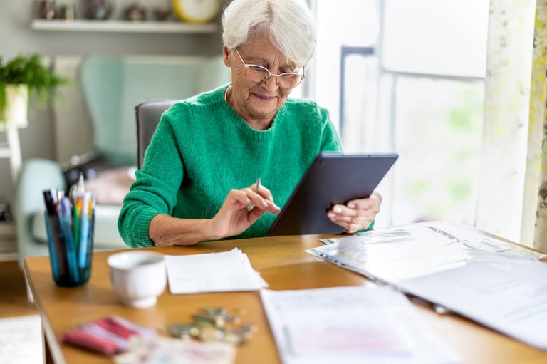 Senior woman using tablet